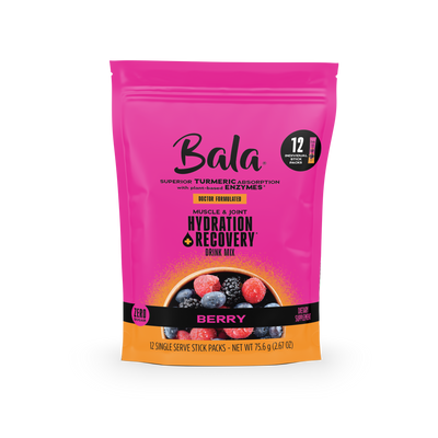 A pink and orange Bala Enzyme Bala Total Body Wellness Drink Mix pouch with berry images, containing 12 single-serve stick packs for rapid hydration and recovery.