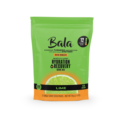 A green and orange Bala Enzyme Bala Total Body Wellness Drink Mix bag, lime flavor, with 12 single-serve stick packs and plant-based electrolytes, featuring a lime slice image on the front.