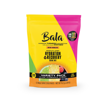 The Bala Enzyme Bala Total Body Wellness Drink Mix variety pack offers 12 single-serve stick packs with turmeric and plant-based electrolytes in lime, pineapple, and berry flavors for fast hydration and recovery.