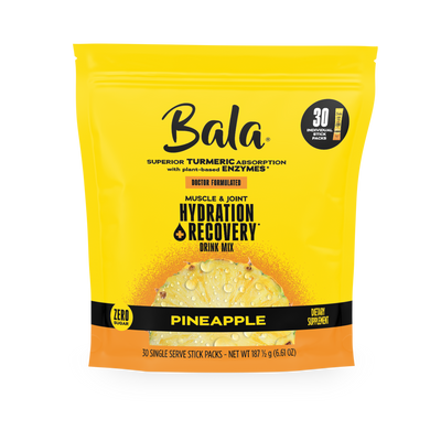Front view of a yellow Bala Enzyme Total Body Wellness Drink Mix package, pineapple flavor, containing 30 single-serve stick packs with plant-based electrolytes for rapid hydration.