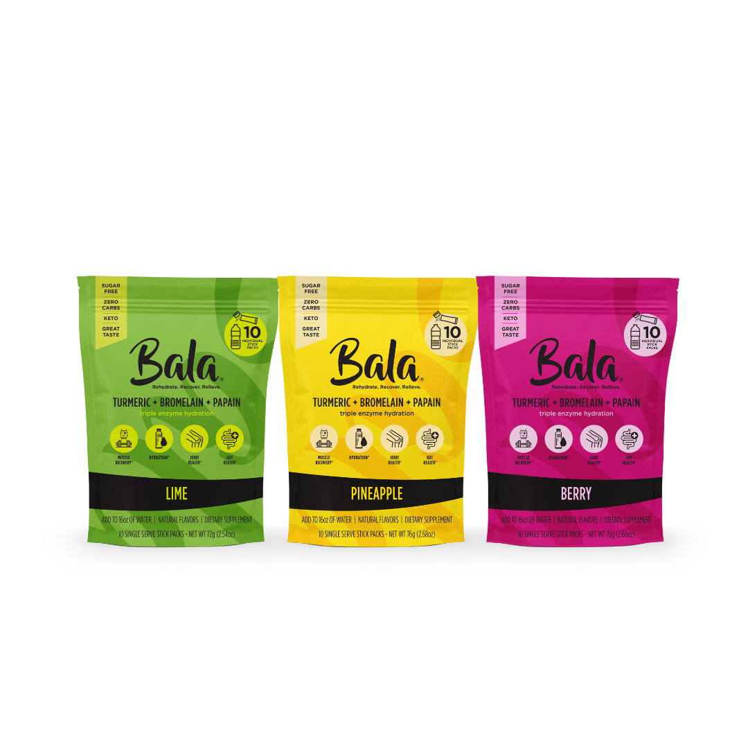 Three packages of Everyone's Favorite Bundle supplement drink mix by Bala Enzyme are displayed. From left to right, the flavors are Lime, Pineapple, and Berry. Each pack promotes total body wellness and indicates the inclusion of turmeric, bromelain, and papain for muscle recovery.